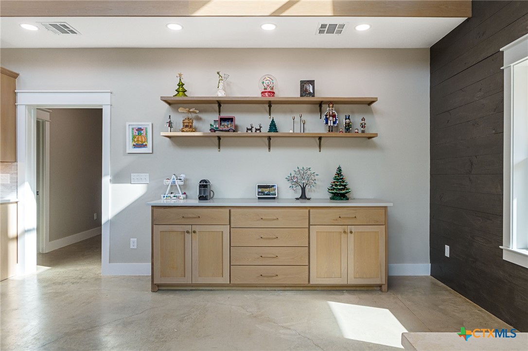 18248 Crows Ranch Road Salado, TX 76571 - Photo 13 of 48 a kitchen with cabinets