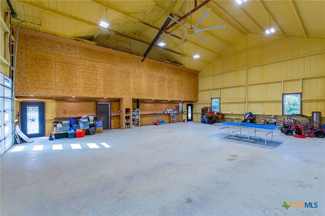 18248 Crows Ranch Road Salado, TX 76571 - Photo 32 of 48 a view of a garage with parked cars