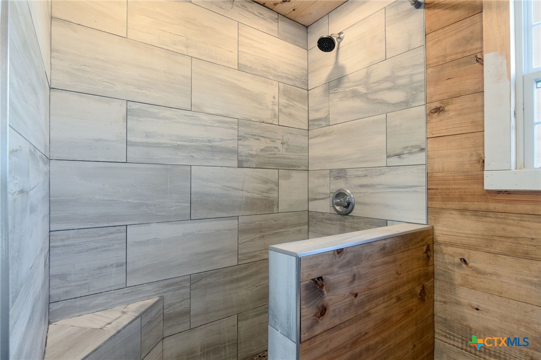 18248 Crows Ranch Road Salado, TX 76571 - Photo 43 of 48 a bathroom with a sink and shower