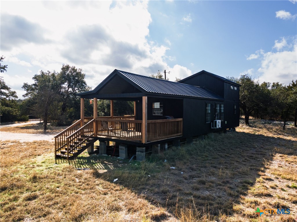 18248 Crows Ranch Road Salado, TX 76571 - Photo 46 of 48 a view of a house with backyard and sitting area