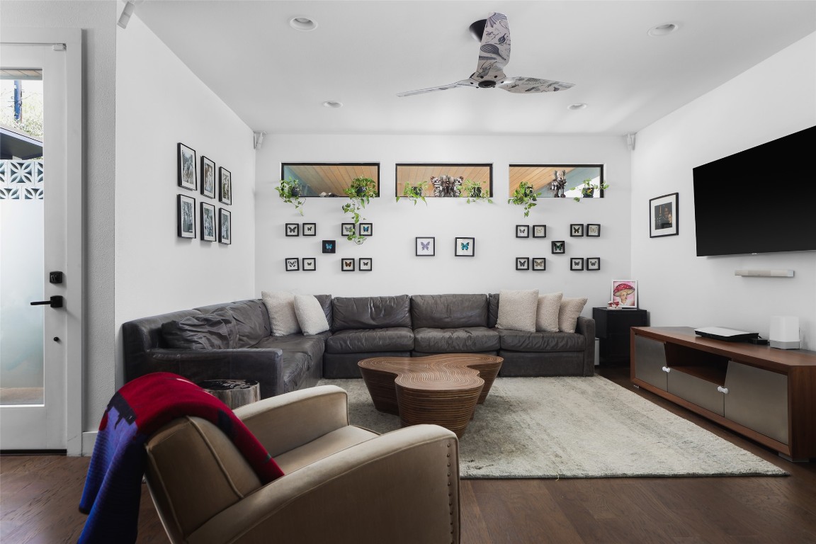 4420 Mt Vernon Drive, Unit A Austin, TX 78745 - Photo 2 of 35 a living room with furniture and a flat screen tv