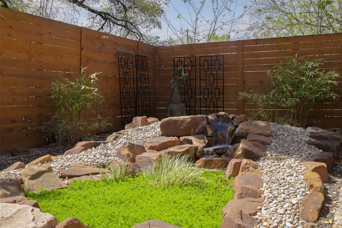 4420 Mt Vernon Drive, Unit A Austin, TX 78745 - Photo 26 of 35 a backyard of a house with table and chairs