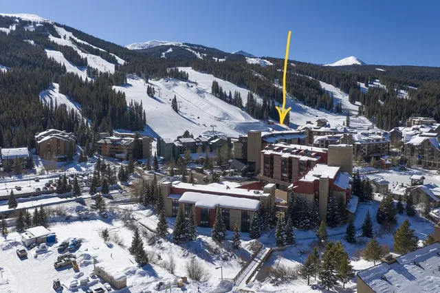 a view of a swimming pool with a yard