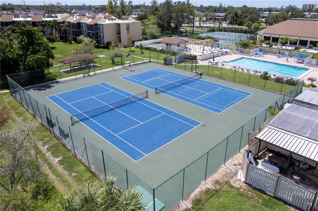 748 White Pine Tree Road, Unit 204 Venice, FL 34285 - Photo 45 of 48 a view of a tennis ground with furniture