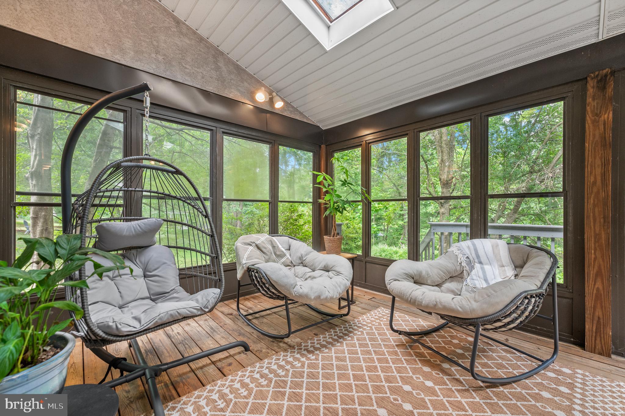 412 Hidden Valley Road Media, PA 19063 - Photo 20 of 51 a living room with furniture and a large window