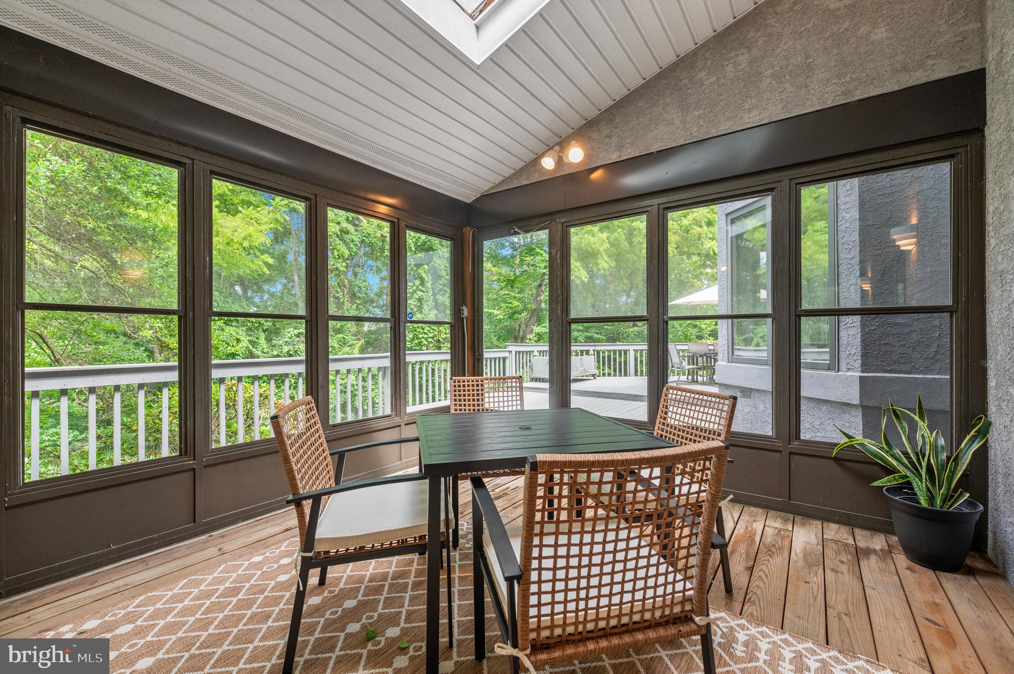 412 Hidden Valley Road Media, PA 19063 - Photo 21 of 51 a view of a dining room with furniture window and wooden floor