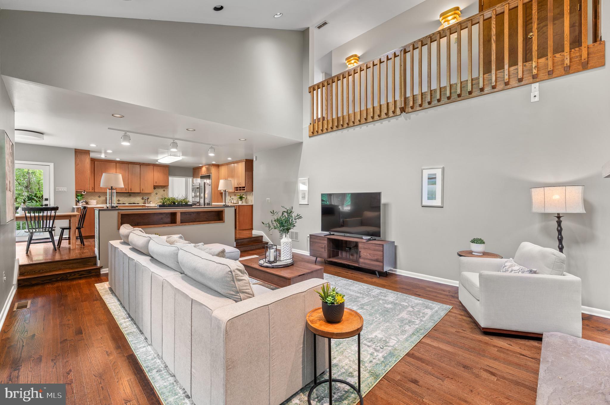 412 Hidden Valley Road Media, PA 19063 - Photo 6 of 51 a living room with furniture and a flat screen tv