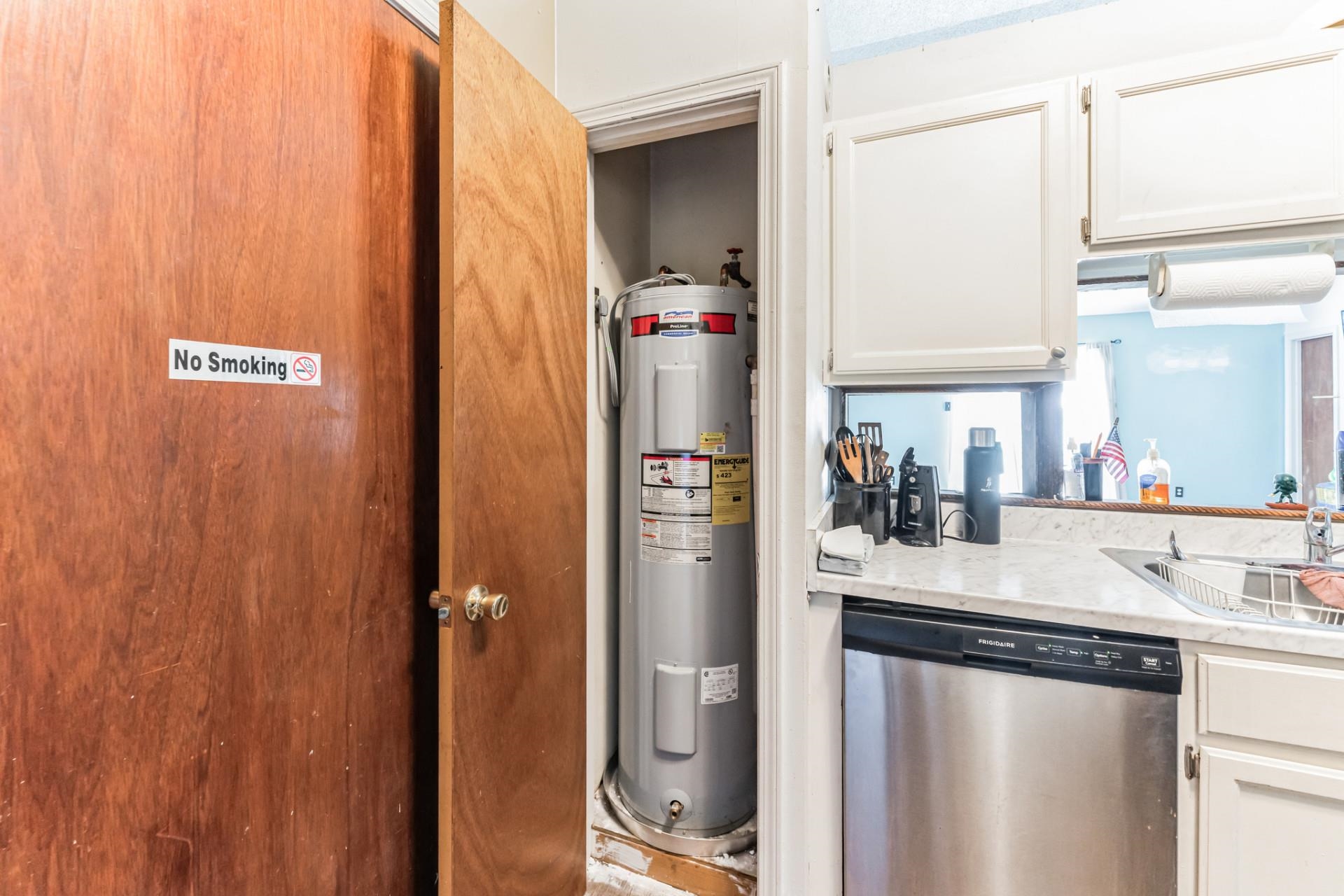 4455 Ryans Run Road Memphis, TN 38141 - Photo 4 of 24 a kitchen with a refrigerator and a sink