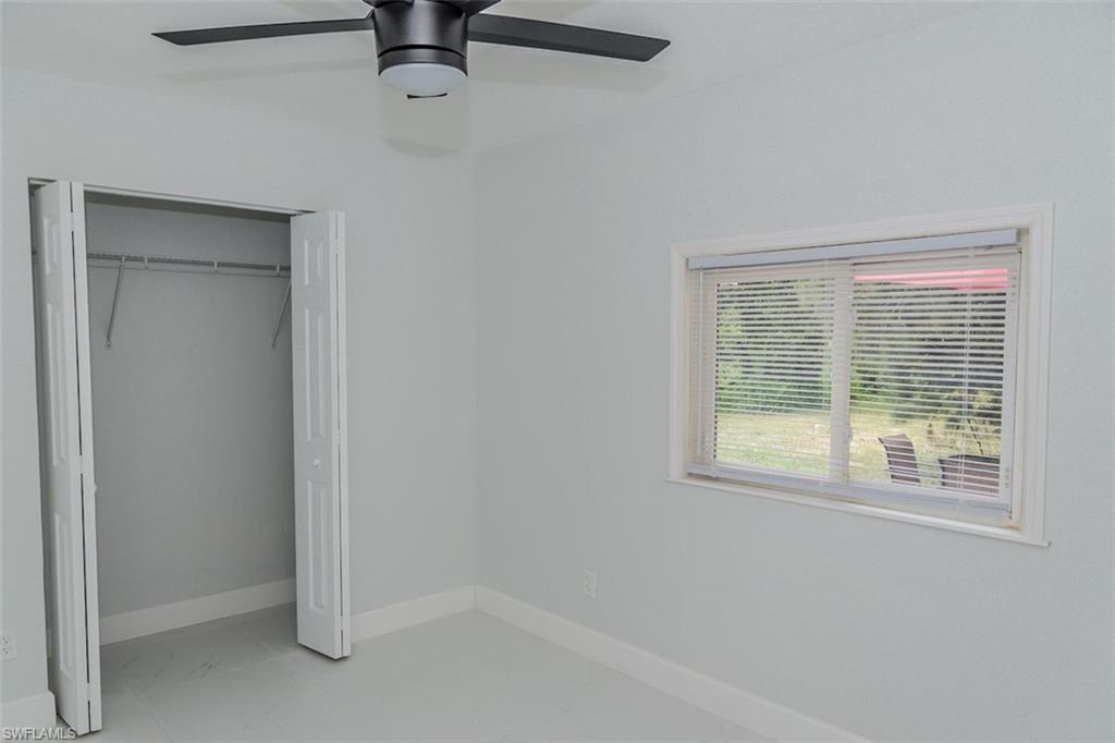 131 22nd Street Northeast Naples, FL 34120 - Photo 25 of 34 a view of an empty room with a window