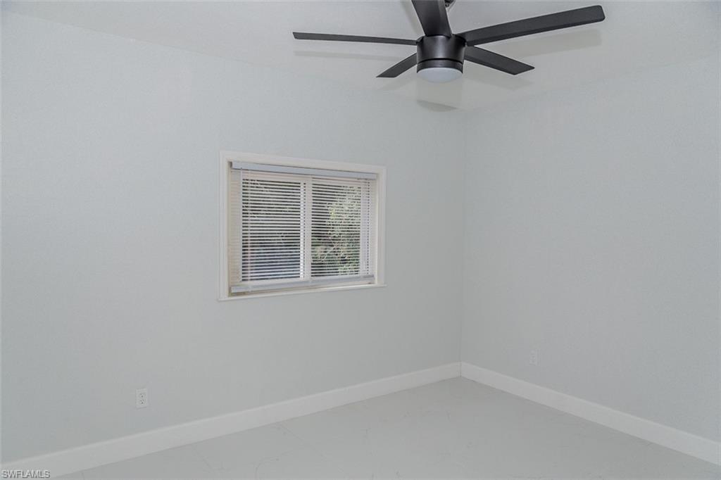 131 22nd Street Northeast Naples, FL 34120 - Photo 26 of 34 a view of a small space with a fan