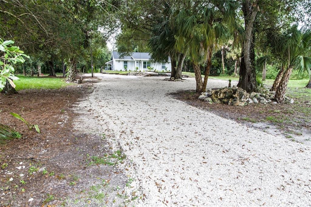 131 22nd Street Northeast Naples, FL 34120 - Photo 4 of 34 a view of a out door space area
