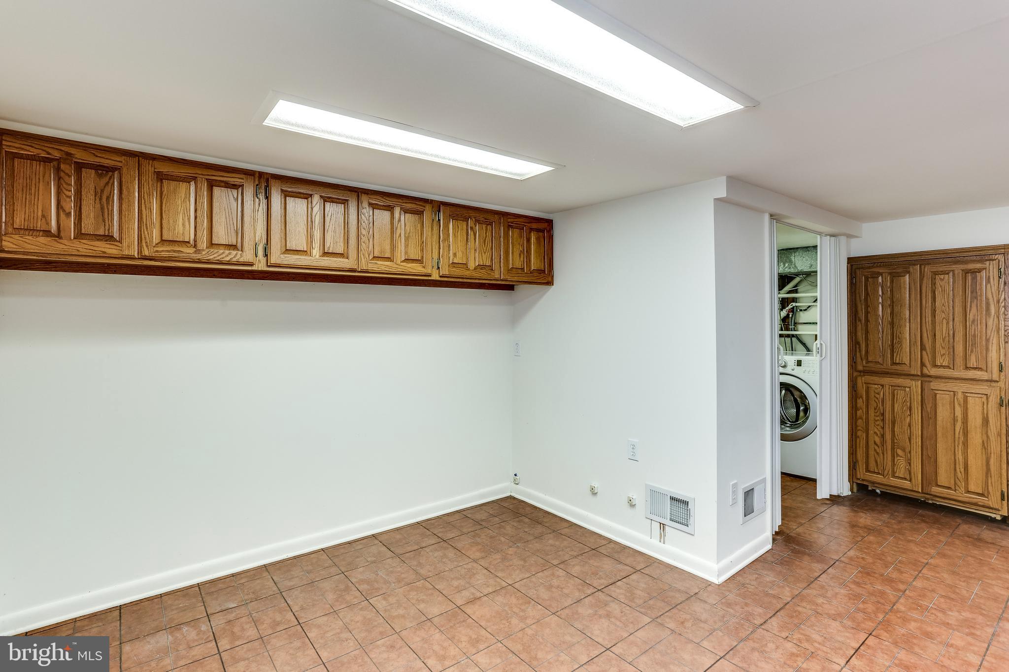 1680 Twickenham Road Pasadena, MD 21122 - Photo 26 of 44 Finished Basement