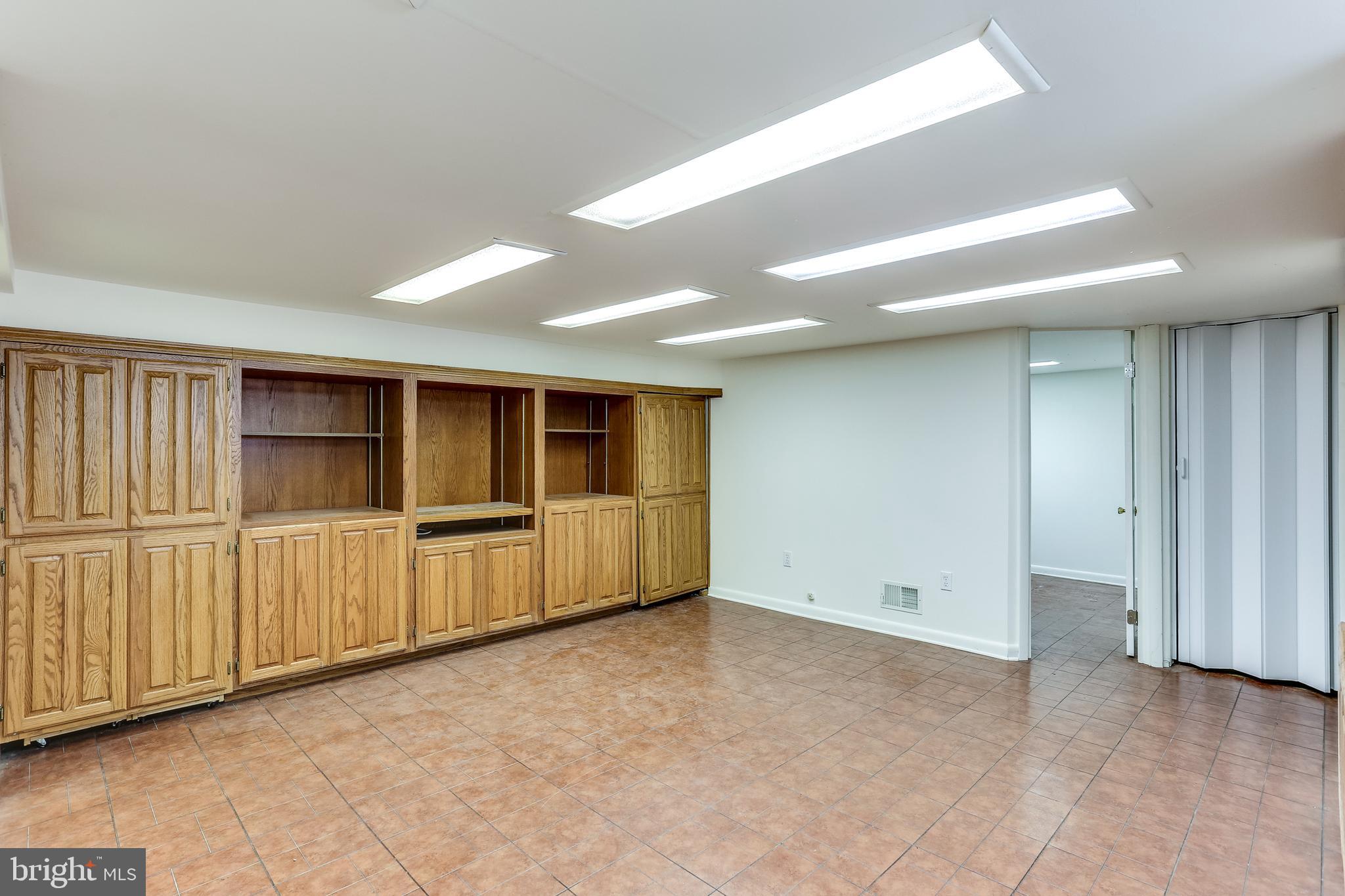 1680 Twickenham Road Pasadena, MD 21122 - Photo 27 of 44 Finished Basement