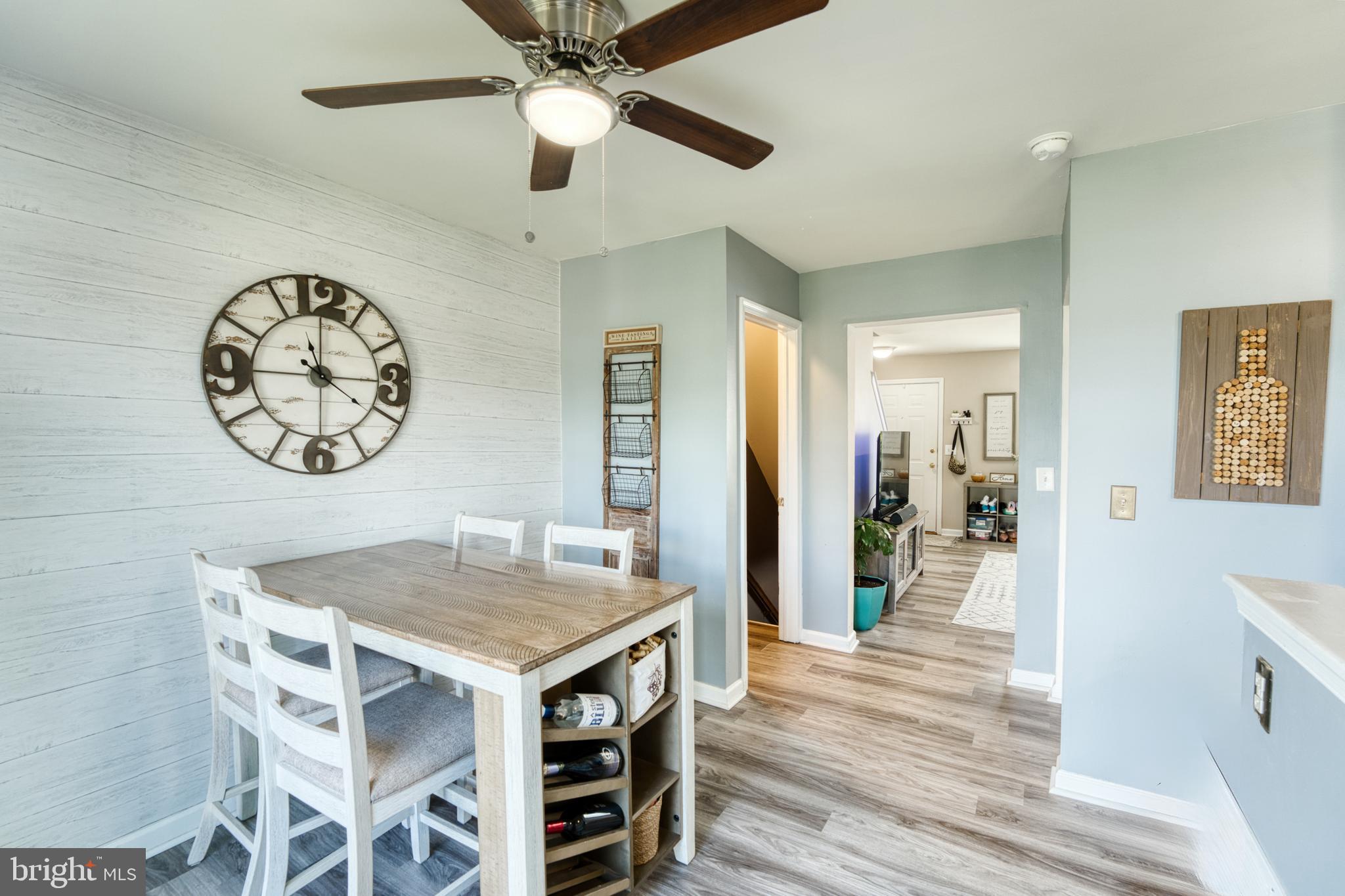 124 Vincent Circle Middletown, DE 19709 - Photo 6 of 19 a view of a dining room with furniture and wooden floor