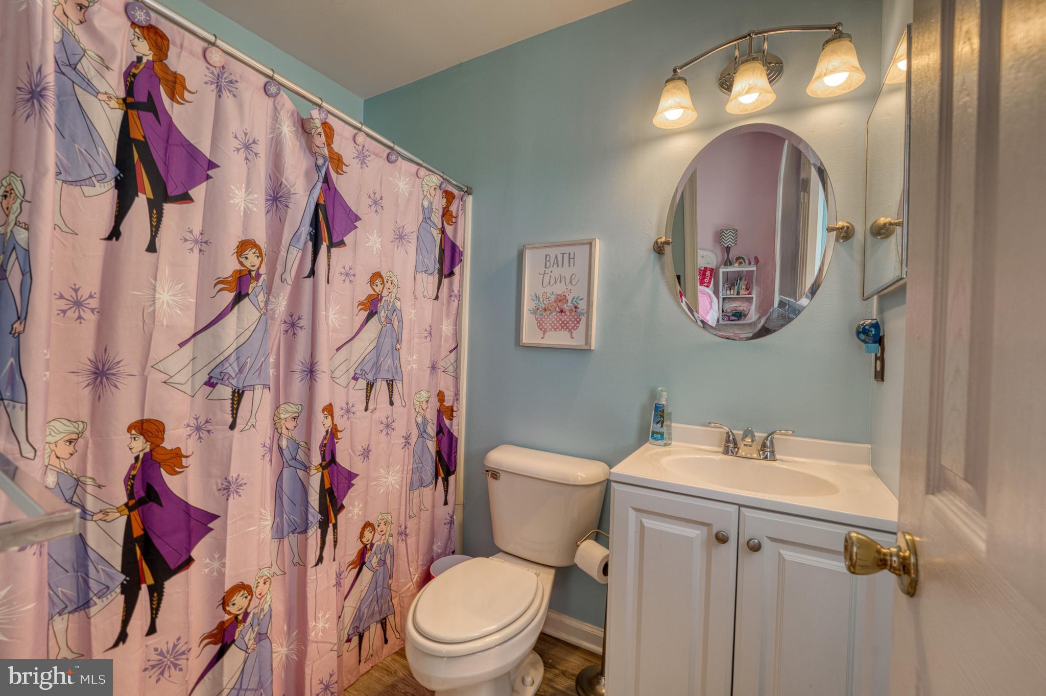 124 Vincent Circle Middletown, DE 19709 - Photo 9 of 19 a bathroom with a toilet sink and vanity