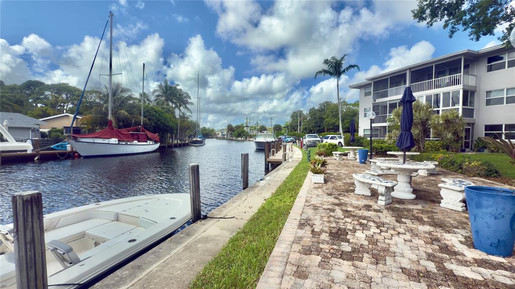 1200 Southwest 12th Court, Unit 305 Fort Lauderdale, FL 33315 - Photo 19 of 29 a view of swimming pool with outdoor seating