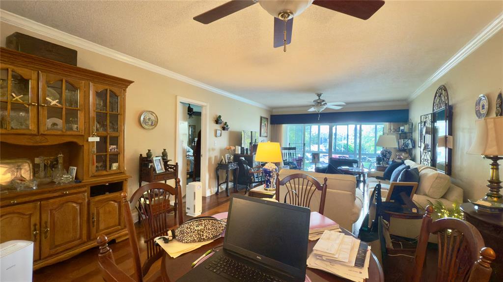 1200 Southwest 12th Court, Unit 305 Fort Lauderdale, FL 33315 - Photo 5 of 29 a very nice looking living room with furniture and a large window