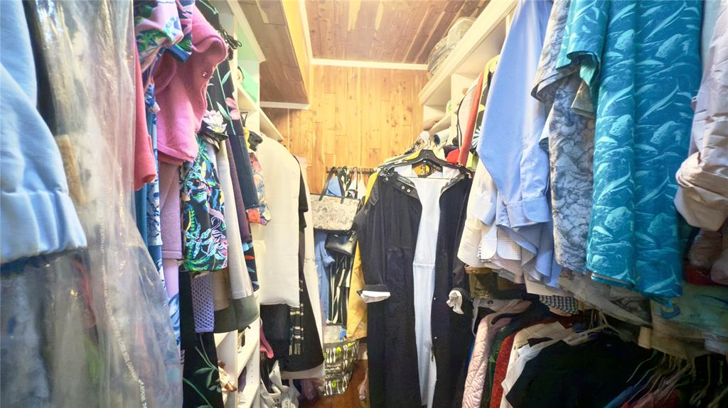 1200 Southwest 12th Court, Unit 305 Fort Lauderdale, FL 33315 - Photo 9 of 29 a view of walk in closet with clothes