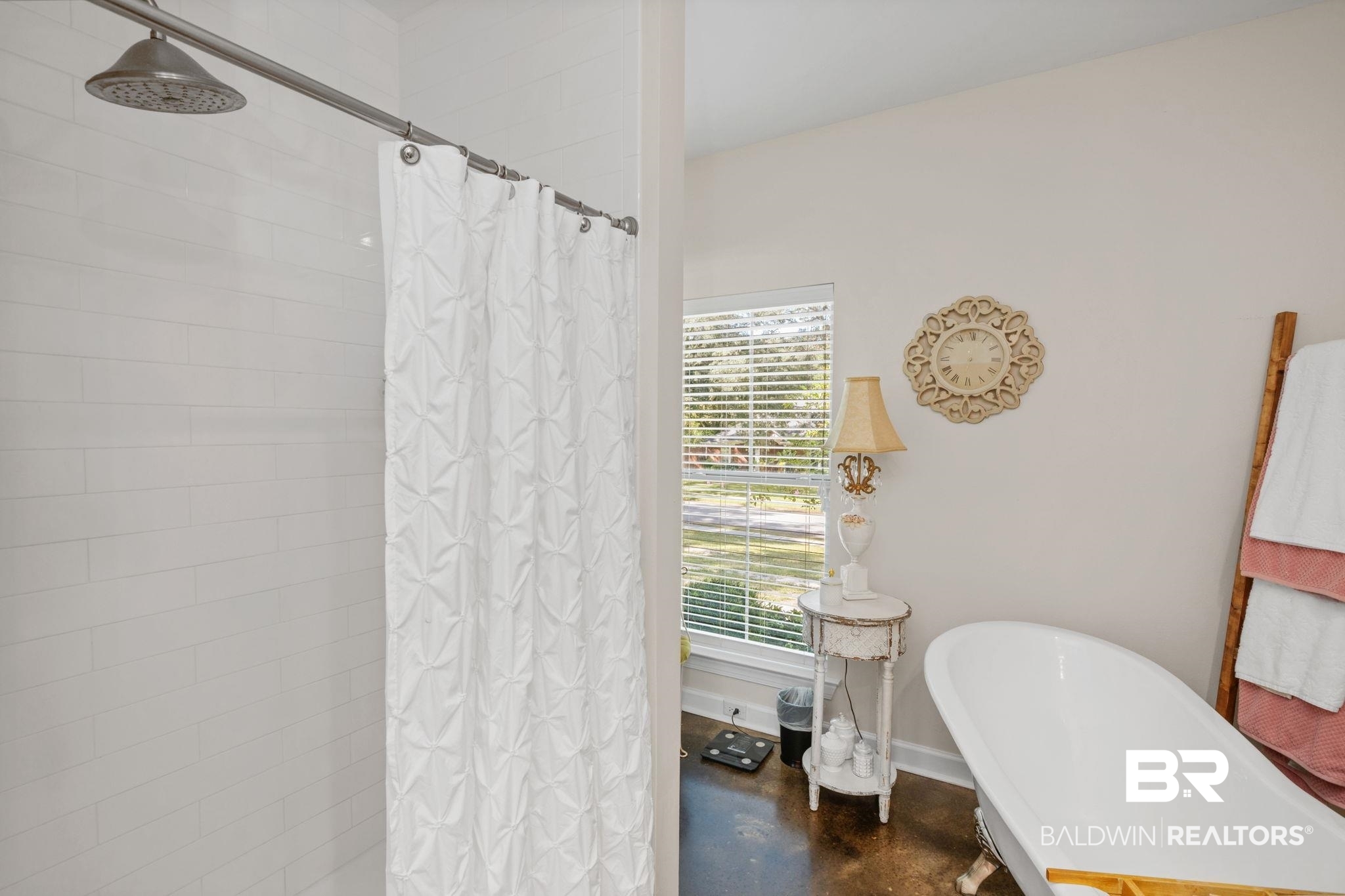 4331 Hamilton Oaks Lane Mobile, AL 36695 - Photo 21 of 38 Bathroom with a freestanding bath, a tile shower, and finished concrete floors