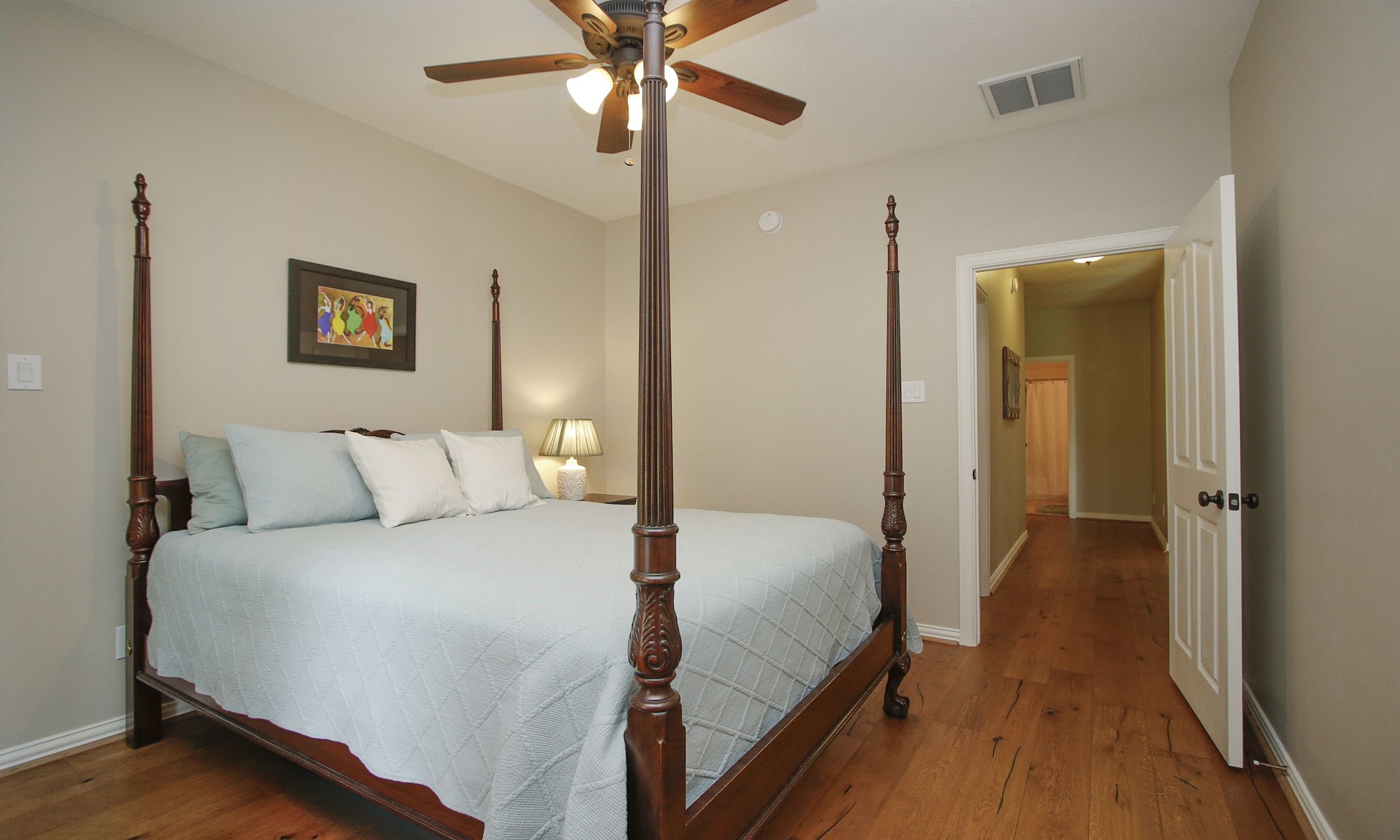 20110 Stormy Pine Lane Spring, TX 77379 - Photo 30 of 44 These stunning hardwood floors lead to the third bedroom and secondary bath at the end of the hall.