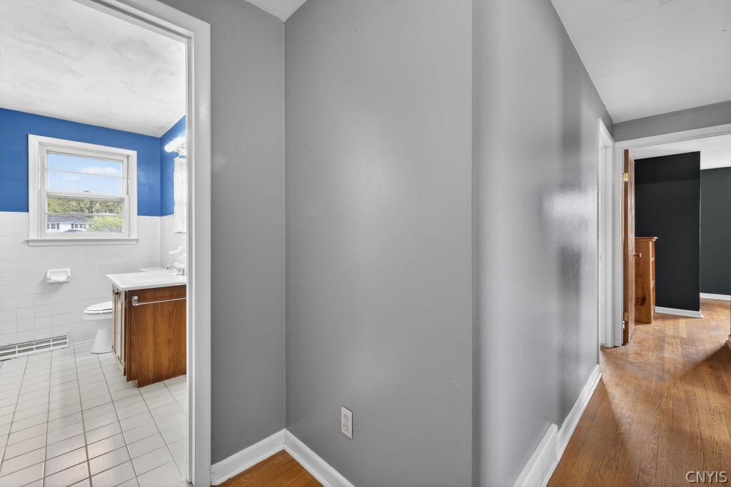 166 Terrace Way Camillus, NY 13031 - Photo 24 of 49 3rd Floor Overlooking Hallway to Bedrooms and Full