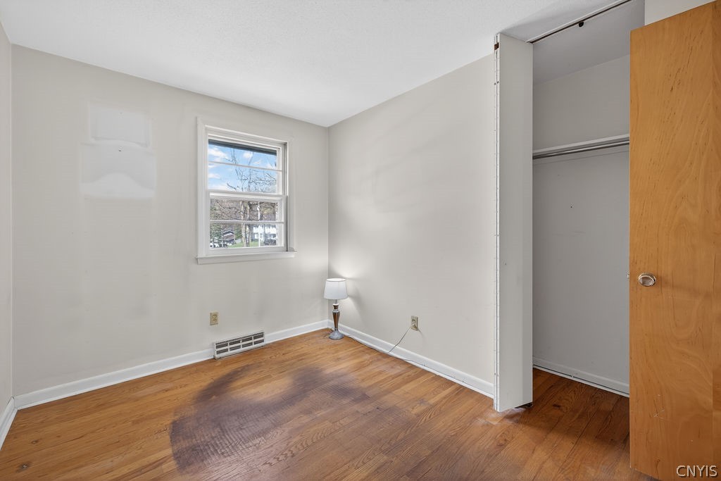 166 Terrace Way Camillus, NY 13031 - Photo 30 of 49 Bedroom #2 with Wood Floors and Large Closet