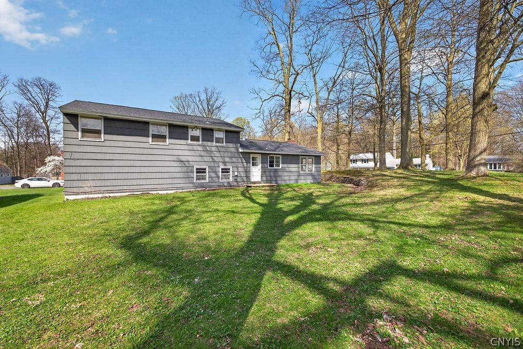 166 Terrace Way Camillus, NY 13031 - Photo 6 of 49 Treed backyard to offer shade during those Hot Sum