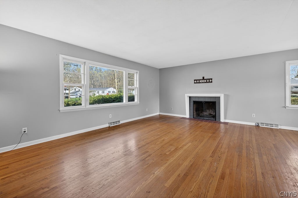 166 Terrace Way Camillus, NY 13031 - Photo 9 of 49 Living Room with Wood Burning Fireplace