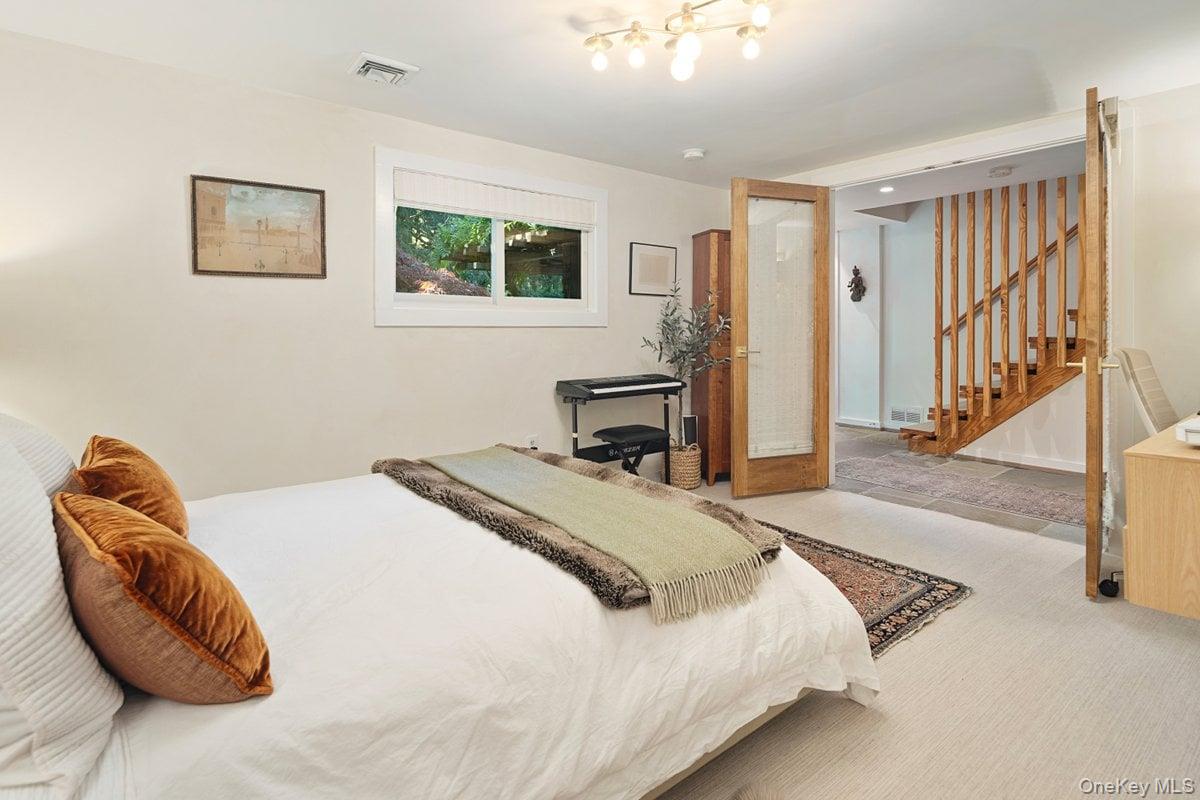 1821 Spring Valley Road Ossining, NY 10562 - Photo 5 of 48 Through French doors on the entry level is a spacious bonus room, which can be used as a bedroom, office, or guest suite.