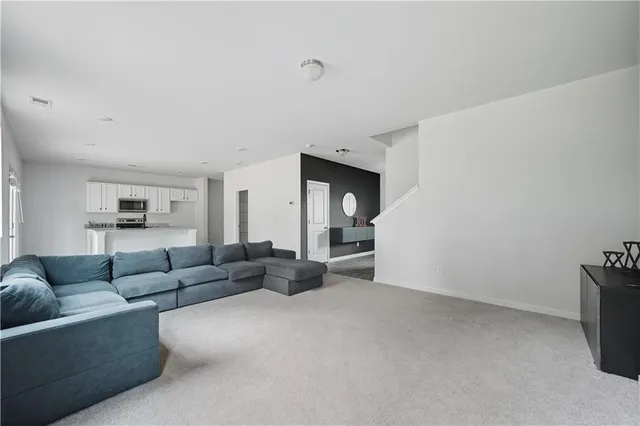 a bedroom with furniture and window