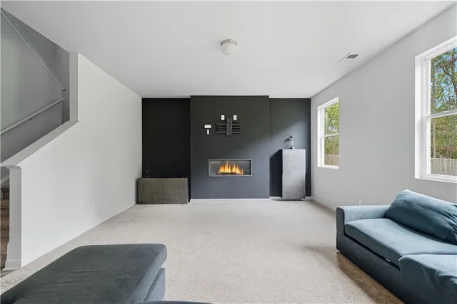 a living room with furniture and a couch