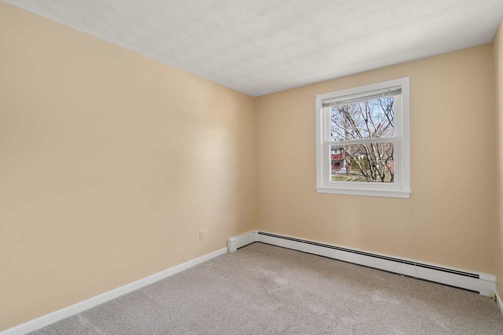 4 Jeffrey Road Canton, MA 02021 - Photo 12 of 26 an empty room with a window