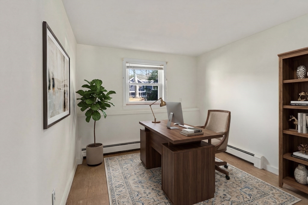 4 Jeffrey Road Canton, MA 02021 - Photo 17 of 26 a view of a workspace with furniture and a potted plant