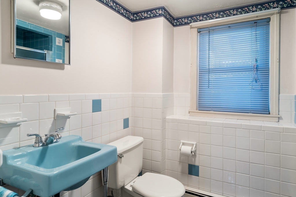 4 Jeffrey Road Canton, MA 02021 - Photo 21 of 26 a bathroom with a sink toilet and shower