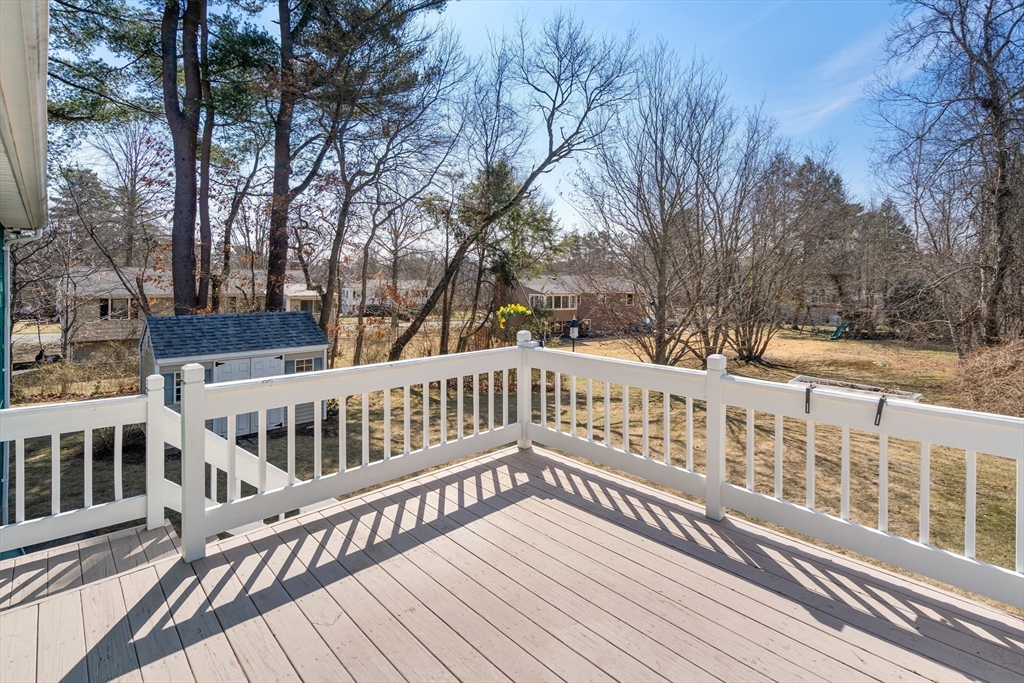 4 Jeffrey Road Canton, MA 02021 - Photo 22 of 26 a view of a wooden deck with trees