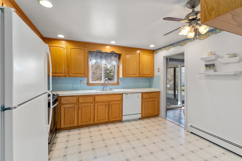 4 Jeffrey Road Canton, MA 02021 - Photo 5 of 26 a large bathroom with a sink a large mirror and a shower