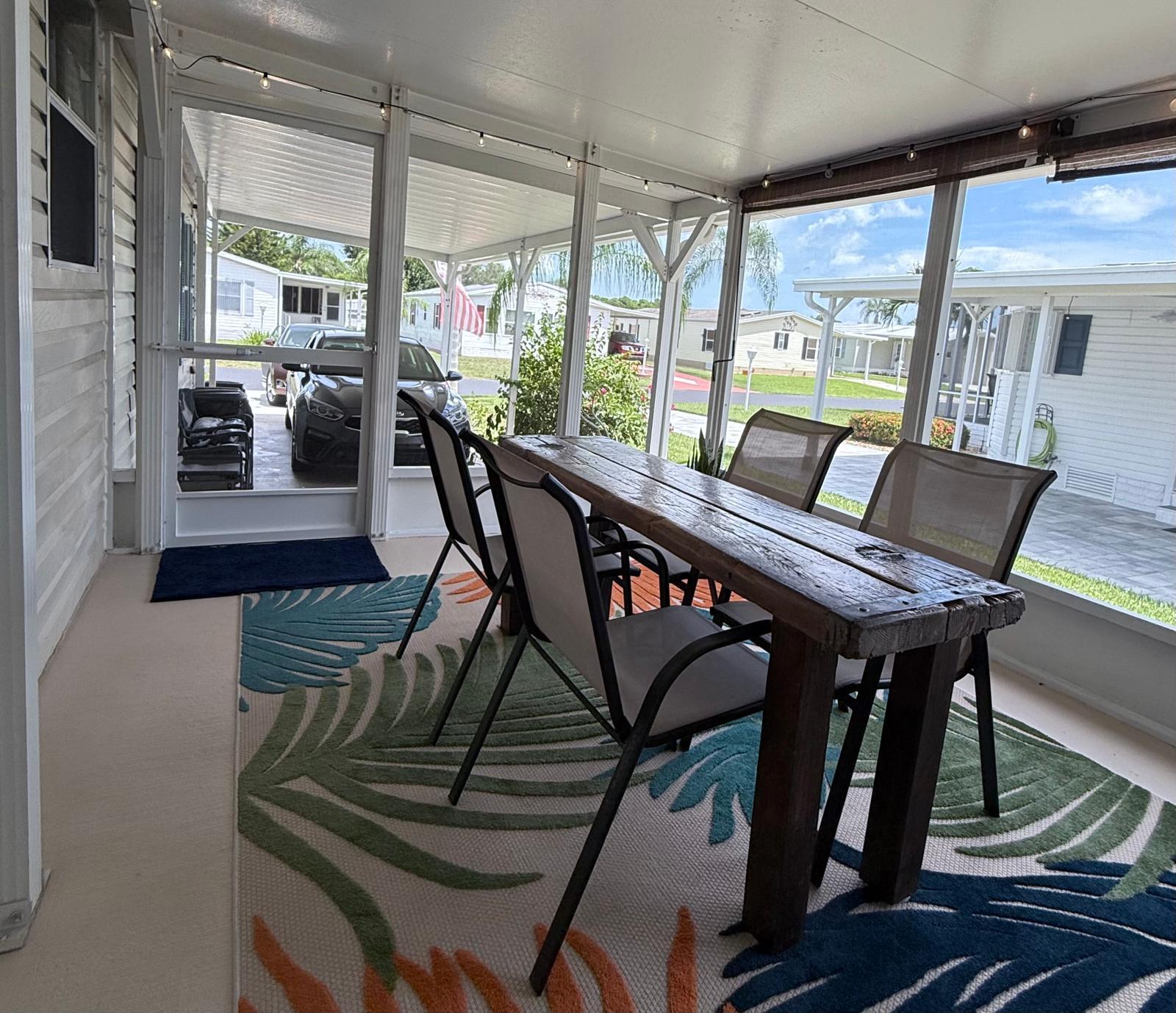 223 Sea Conch Place, Unit 14 Fort Pierce, FL 34982 - Photo 12 of 28 a view of a dining room with furniture window and outside view