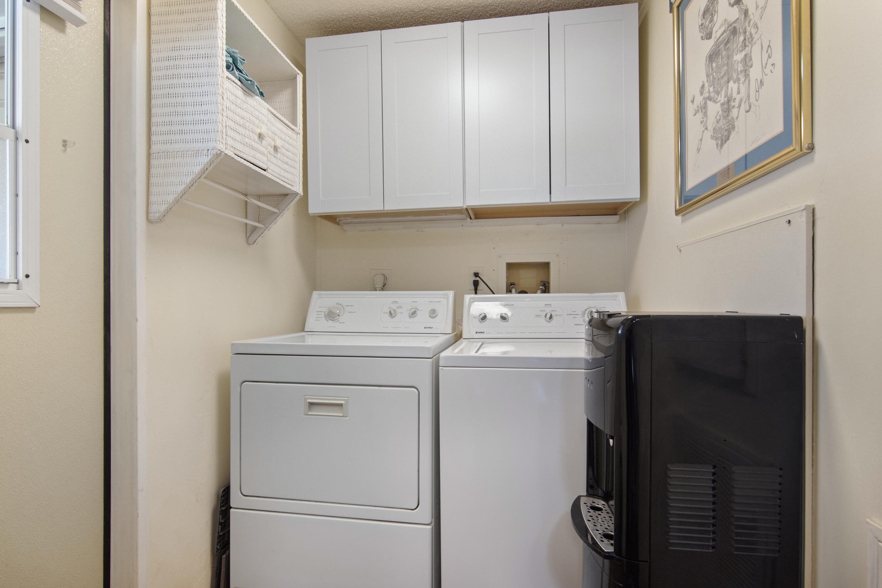 223 Sea Conch Place, Unit 14 Fort Pierce, FL 34982 - Photo 28 of 28 a utility room with dryer and washer