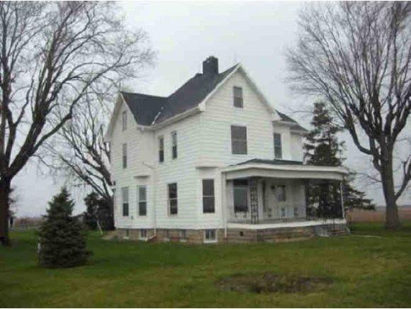 11767-c R North 400th Street Kansas, IL 61933 - Photo 1 of 1 a front view of a house with a garden