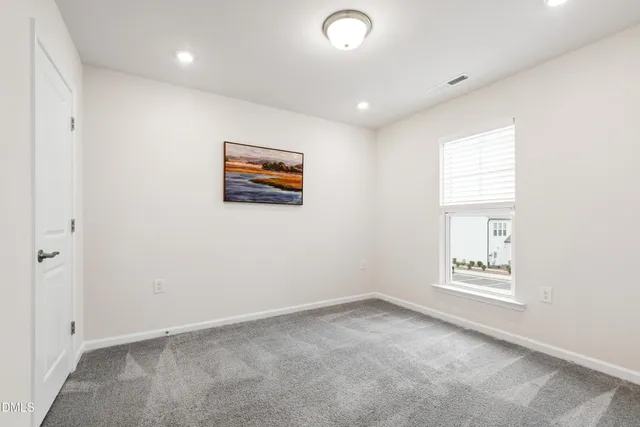 a kitchen with granite countertop stainless steel appliances and wooden cabinets
