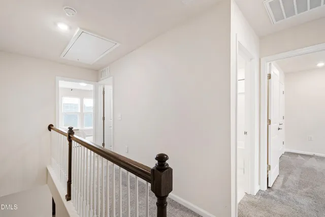 a bathroom with a shower and a shower curtain