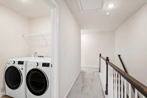 a view of a hallway with a window