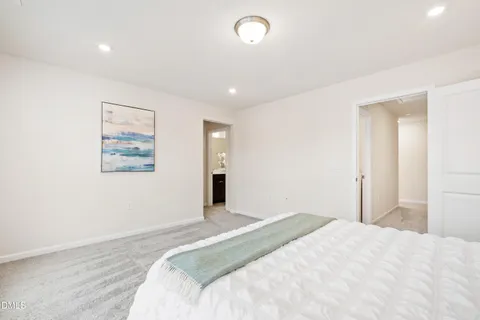 a view of a hallway with washer and dryer