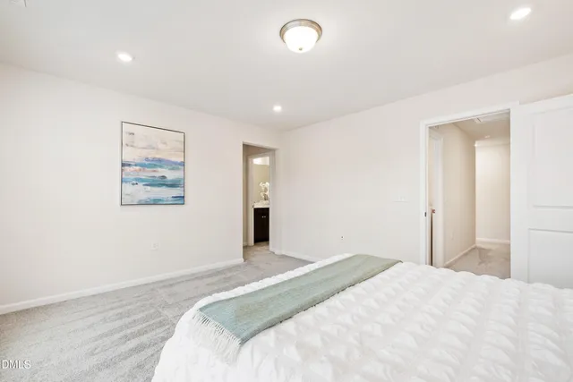 a view of a hallway with washer and dryer
