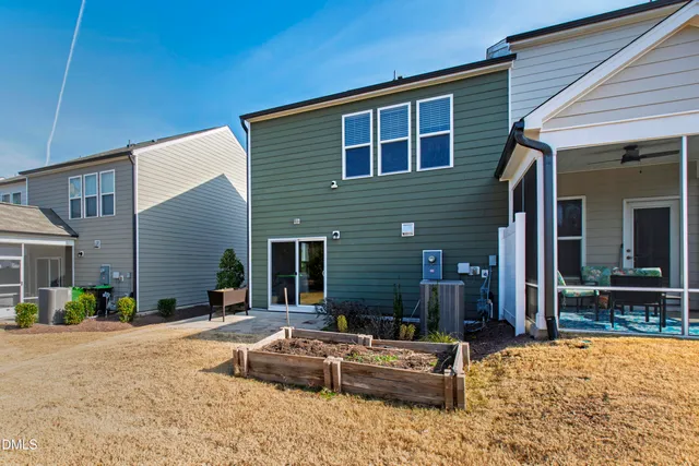 a view of a swimming pool with an outdoor space and seating area