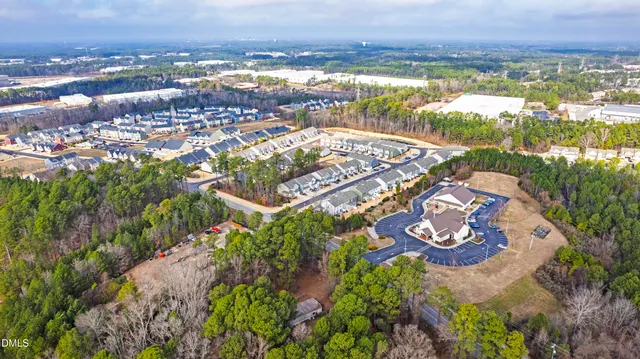 a swimming pool view with a outdoor seating space