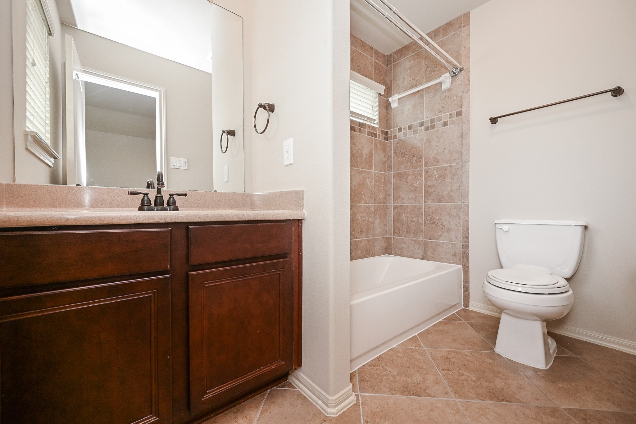 19 Sandwell Place Spring, TX 77389 - Photo 27 of 33 Secondary bathroom with tub/shower combos and ample vanity storage