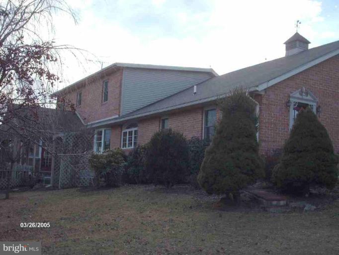 8120 Pious Ridge Road Berkeley Springs, WV 25411 - Photo 6 of 24 Back yard
