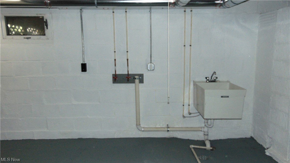 17 Clover Street Rittman, OH 44270 - Photo 27 of 34 Laundry hookups with deep sink in basement