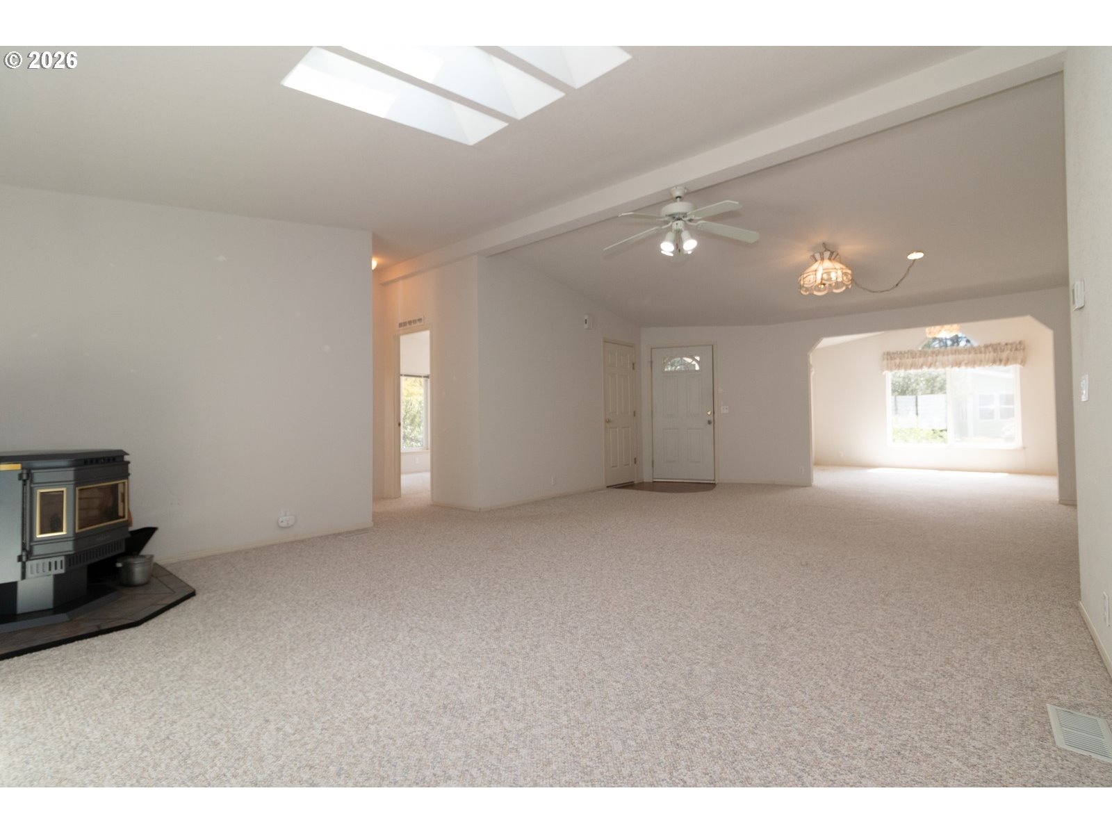 499 Sherwood Loop Florence, OR 97439 - Photo 11 of 39 a view of an empty room with a window